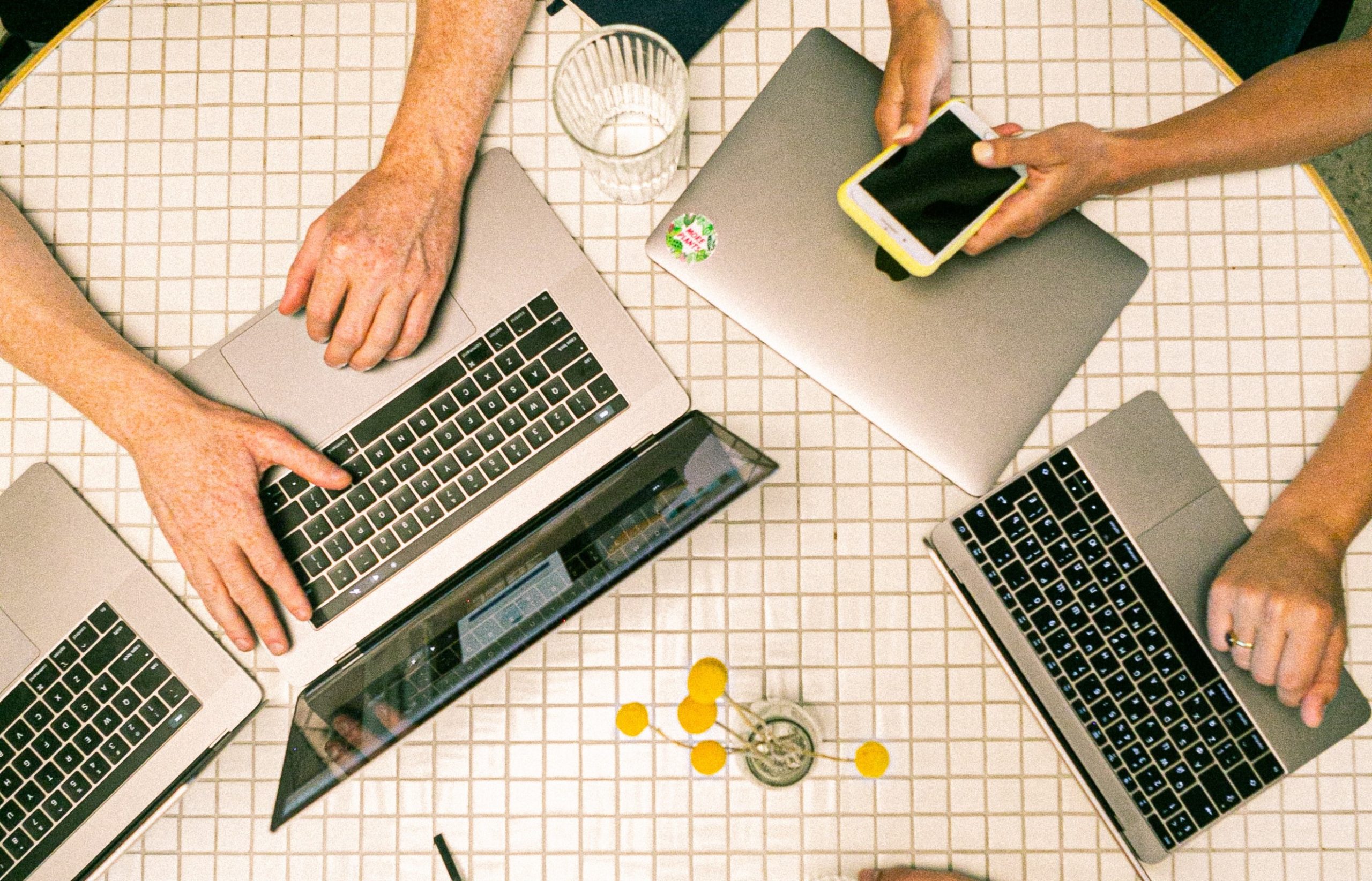 people on laptops social media strategy